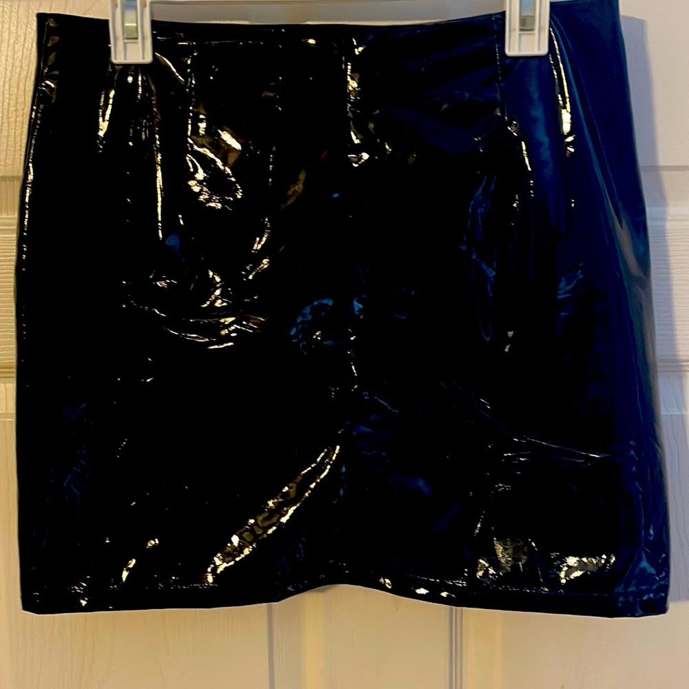 Large black patent skirt